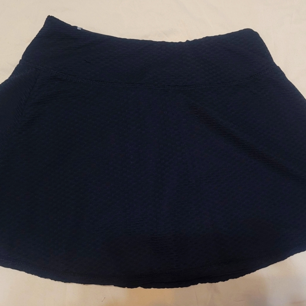 Women's XS Kyodan golf/tennis/pickleball black skort.